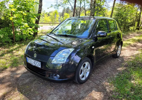 samochody osobowe Suzuki Swift cena 15900 przebieg: 93000, rok produkcji 2007 z Olkusz